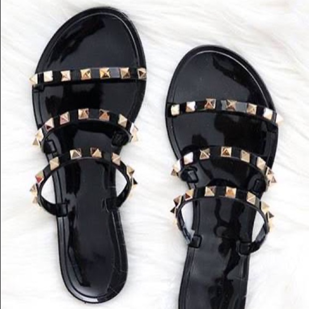 Studded black jelly sandals